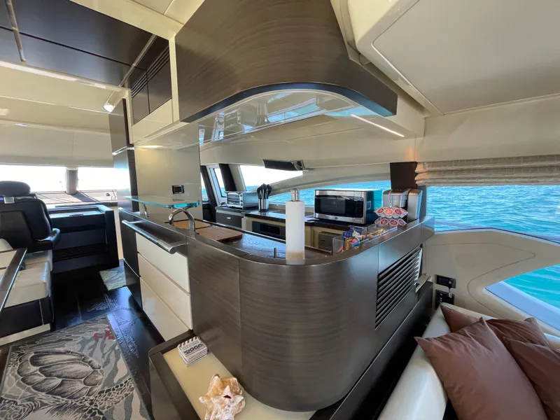 Slide: The Image of Luxurious interior of a 2014 Azimut 70 yacht with modern kitchen and ocean view. - 47
