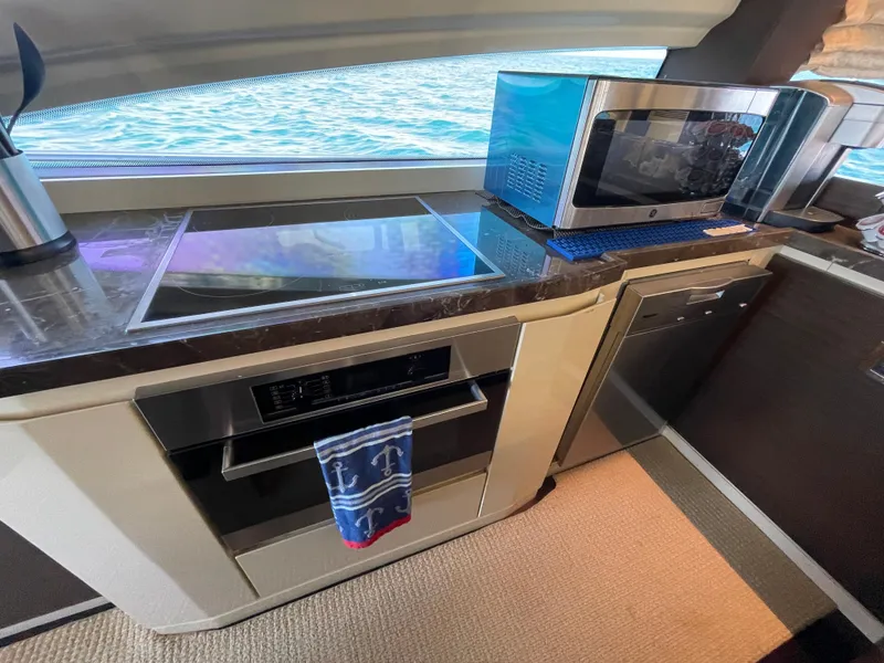 Slide: The Image of Kitchen area on a 2014 Azimut 70 yacht. - 49