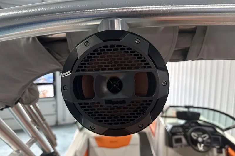 Slide: The Image of Close-up of a speaker on a 2021 MasterCraft NXT24 boat, showcasing audio equipment. - 21