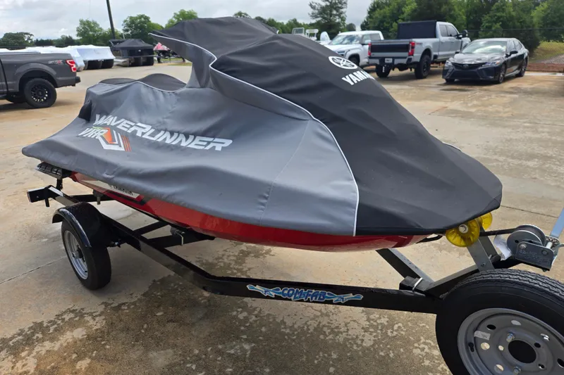 Slide: The Image of 2019 Yamaha WaveRunner VXR covered on trailer in parking lot. - 7