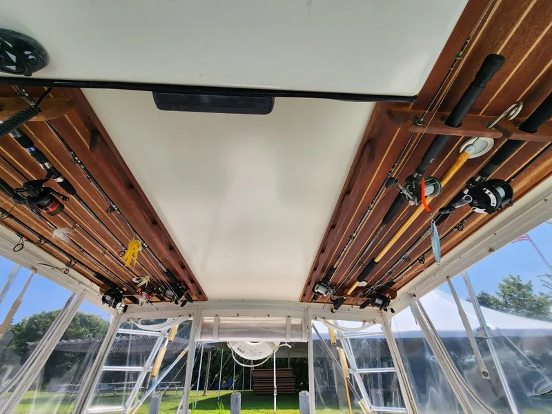 Slide: The Image of Fishing rod storage on 2000 Pursuit 3400 Express boat. - 19