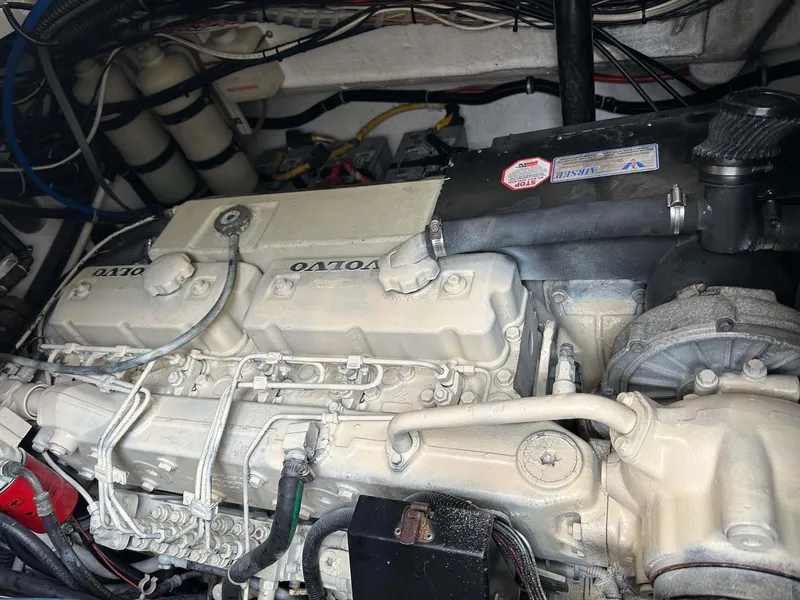 Slide: The Image of Engine compartment of a 2000 Pursuit 3400 Express boat with Volvo diesel engine. - 22