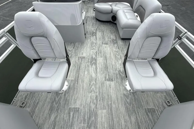Slide: The Image of 2026 Landau Alure boat interior with sleek white seating and modern flooring. - 11