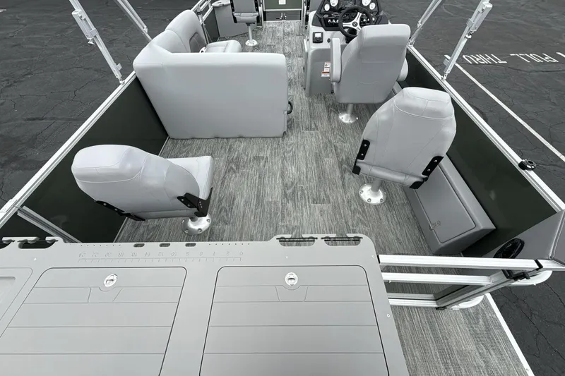 Slide: The Image of 2026 Landau Alure boat interior with gray seating and modern design. - 12