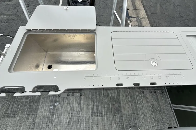 Slide: The Image of Fishing station on 2026 Landau Alure boat with sink and measuring board. - 17