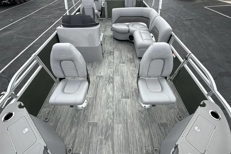 Slide: The Image of 2026 Landau Alure pontoon boat interior with gray seating and modern design. - 9