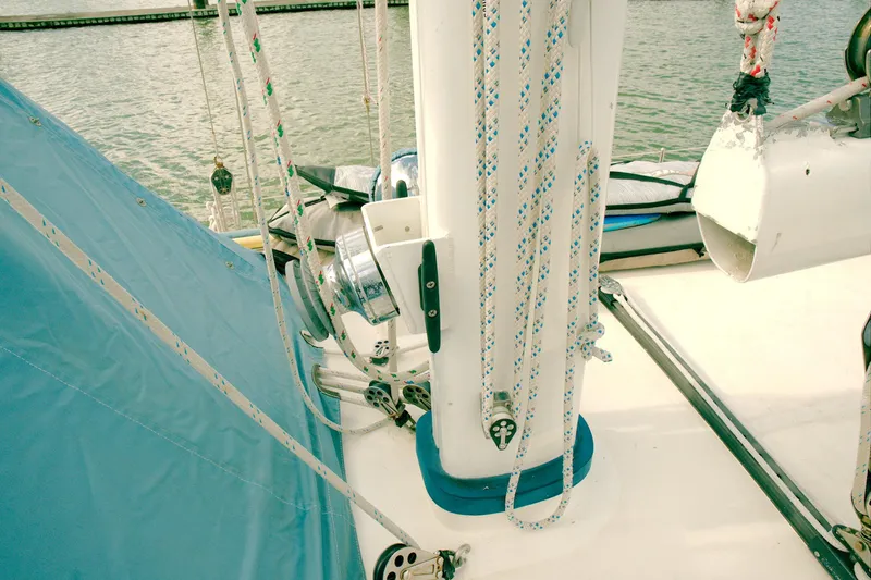 Slide: The Image of Crealock 1997 custom schooner deck with ropes and mast details. - 13