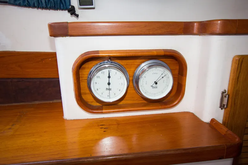 Slide: The Image of Cockpit of 1997 Crealock custom-built raised cabintop schooner, docked at marina. - 32