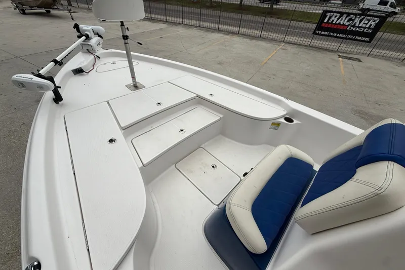 Slide: The Image of 2019 Blue Wave 2200 PureBay boat interior with seating and storage compartments. - 9