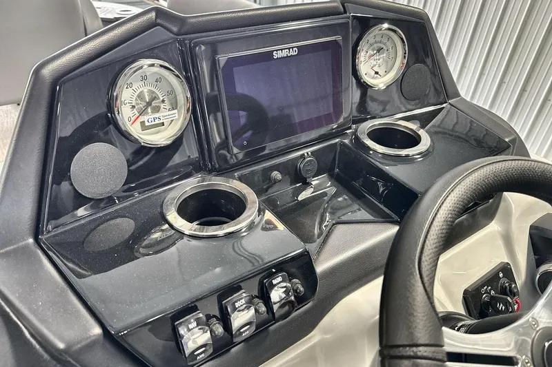 Slide: The Image of Dashboard of 2026 Landau Island Breeze 23F with GPS and controls. - 15