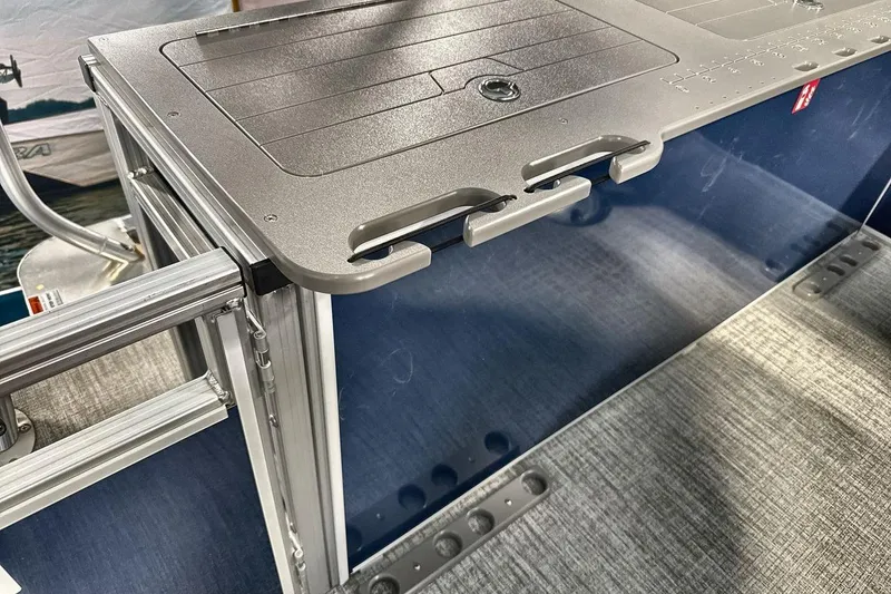 Slide: The Image of 2026 Landau Island Breeze 23F boat detail, featuring sleek aluminum and textured surfaces. - 23