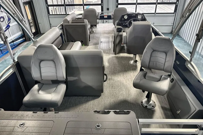Slide: The Image of Interior of 2026 Landau Island Breeze 23F pontoon boat with gray seating and modern design. - 9