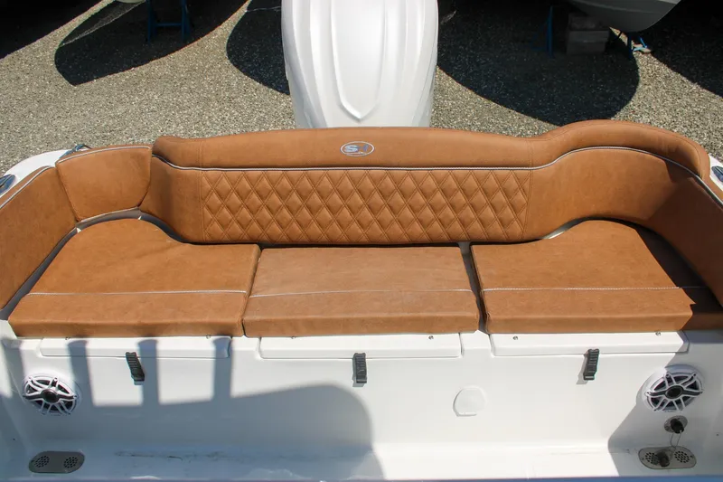 Slide: The Image of Luxurious brown seating on 2026 Sea Hunt Ultra 255 SE boat, featuring diamond stitching. - 3