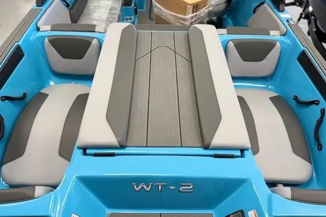 Slide: The Image of Interior of 2026 Heyday WT-2DC boat with blue and gray seating. - 3