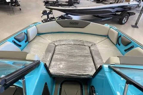 Slide: The Image of 2026 Heyday WT-2DC boat interior with blue and gray seating, wrapped cushion. - 7