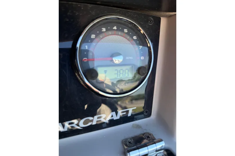 Slide: The Image of Close-up of 2023 Starcraft SLS 5 tachometer displaying RPM and digital readout. - 12