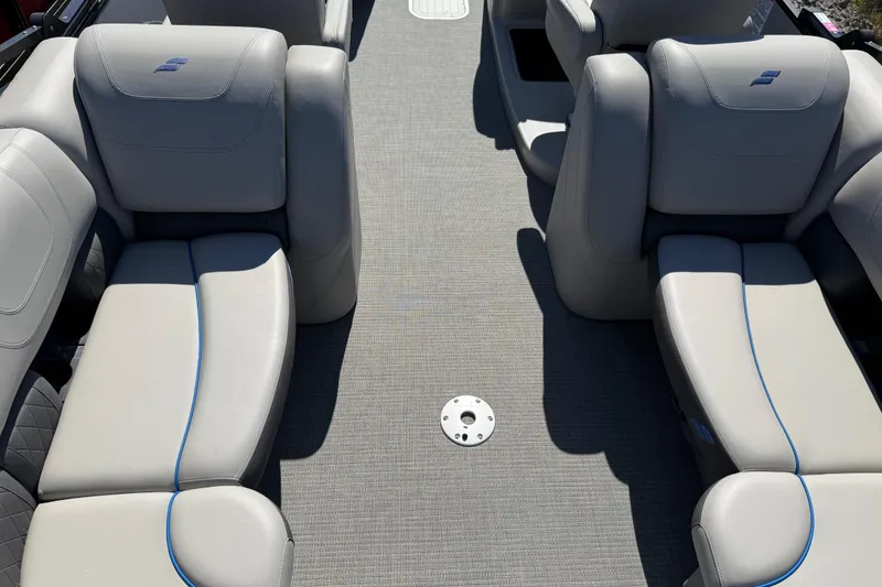 Slide: The Image of 2023 Starcraft SLS 5 boat interior with gray seating and blue accents. - 15