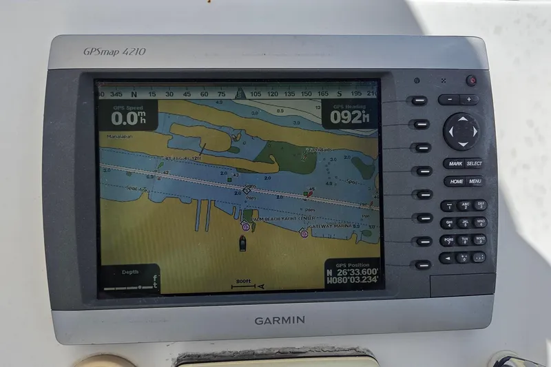 Slide: The Image of Garmin GPSmap 4210 on 2009 Sea Fox 256 Walk Around displaying nautical chart. - 11