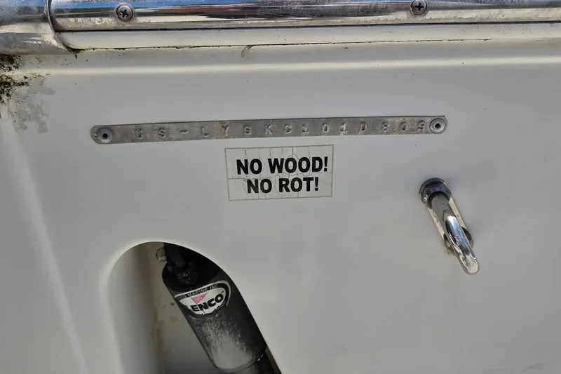 Slide: The Image of 2009 Sea Fox 256 Walk Around boat detail with "No Wood! No Rot!" sticker. - 15