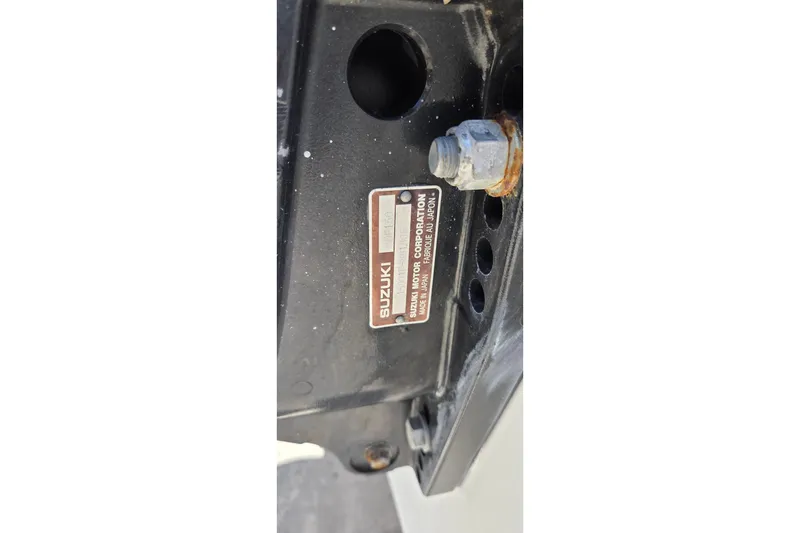 Slide: The Image of Close-up of Suzuki motor label on 2009 Sea Fox 256 Walk Around boat. - 16