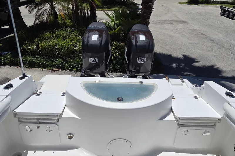 Slide: The Image of 2009 Sea Fox 256 Walk Around boat with dual Suzuki 150 engines and livewell. - 9