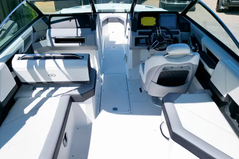 Slide: The Image of 2023 Cobalt R4 Outboard boat interior with modern seating and advanced dashboard controls. - 10