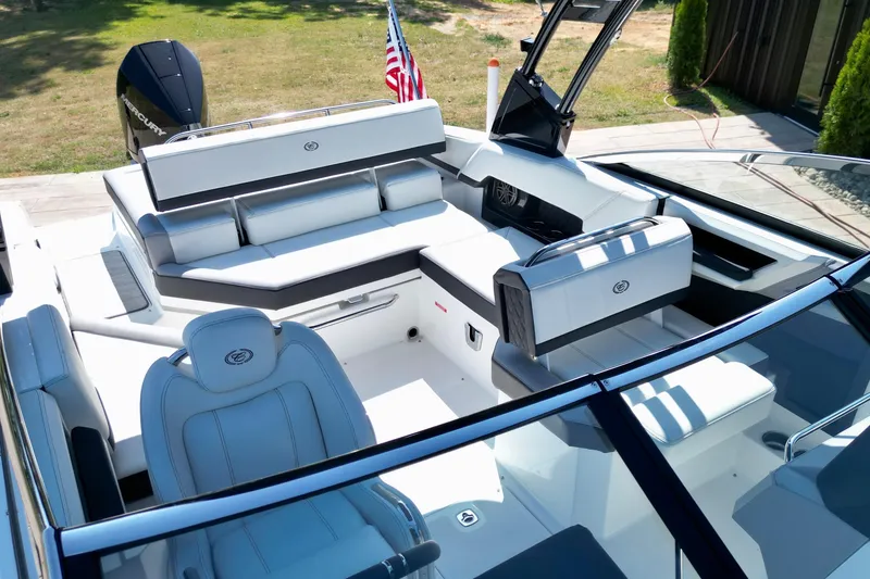 Slide: The Image of 2023 Cobalt R4 Outboard boat interior with luxurious seating and modern design. - 6