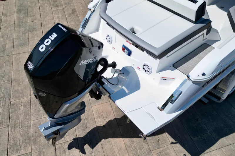 Slide: The Image of 2023 Cobalt R4 Outboard boat with Mercury engine, rear view on dock. - 9