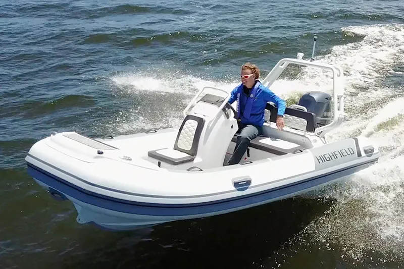 Slide: The Image of Manufacturer Provided Image: 2021 Highfield Sport 460 boat cruising on open water. - 13