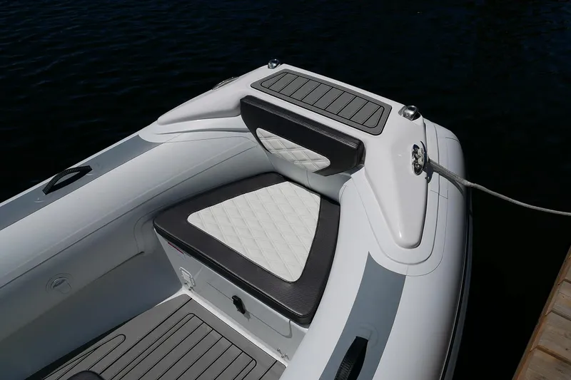 Slide: The Image of Manufacturer Provided Image: Highfield Sport 460 boat, 2021 model, featuring sleek seating and modern design. - 7