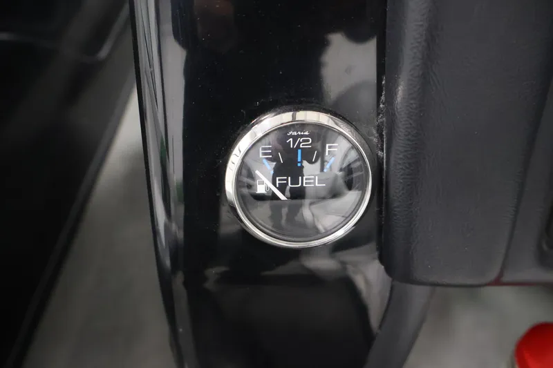 Slide: The Image of Fuel gauge of a 2011 Moomba Mobius LSV boat, showing half-full. - 20