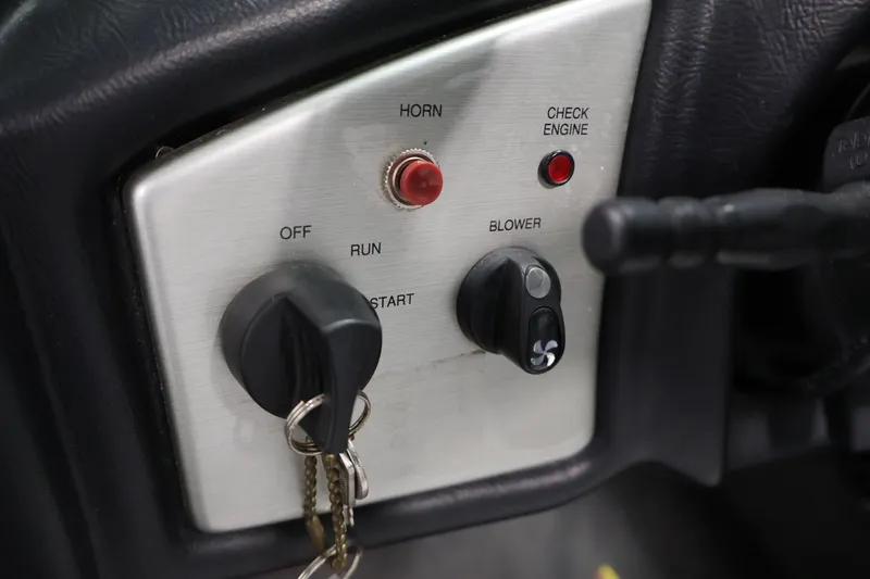 Slide: The Image of 2011 Moomba Mobius LSV dashboard with ignition, horn, and blower controls. - 21