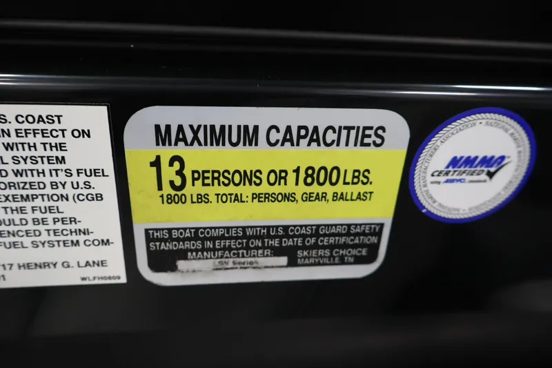 Slide: The Image of 2011 Moomba Mobius LSV capacity label: 13 persons or 1800 lbs, NMMA certified. - 25