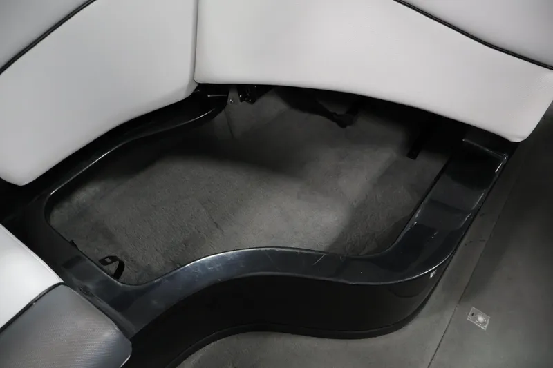 Slide: The Image of 2011 Moomba Mobius LSV interior seating area with gray upholstery and black trim. - 33