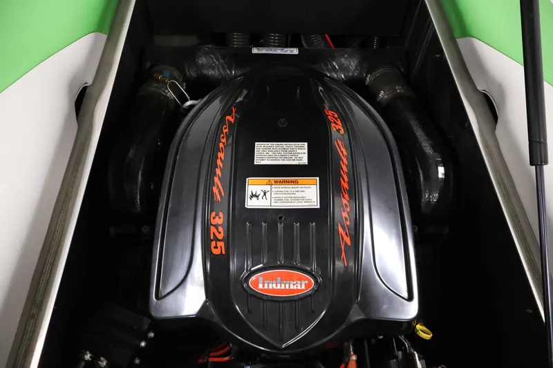 Slide: The Image of 2011 Moomba Mobius LSV engine, Indmar Assault 325, black cover with orange lettering. - 37