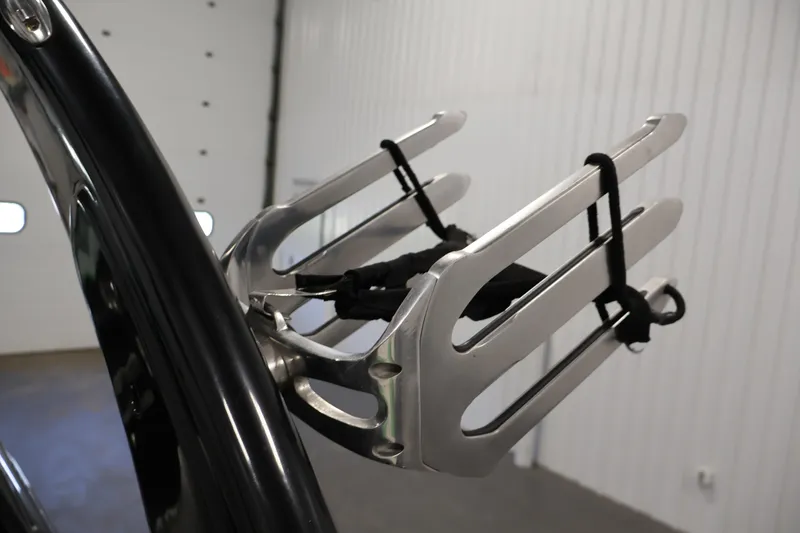 Slide: The Image of 2011 Moomba Mobius LSV wakeboard rack in a garage setting. - 40