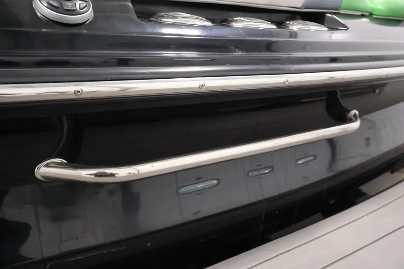 Slide: The Image of 2011 Moomba Mobius LSV boat detail with chrome handle and control panel. - 43
