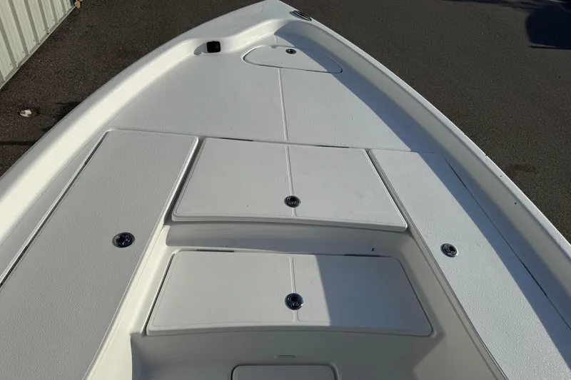 Slide: The Image of 2026 Blazer Bay PURE BAY 2200 boat deck, featuring storage compartments and sleek design. - 11