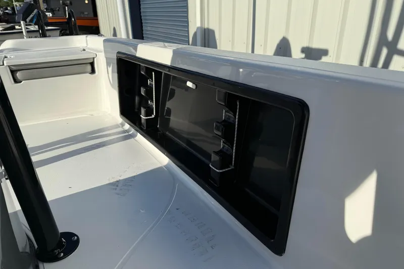 Slide: The Image of 2026 Blazer Bay PURE BAY 2200 boat interior with storage compartment and seating. - 17