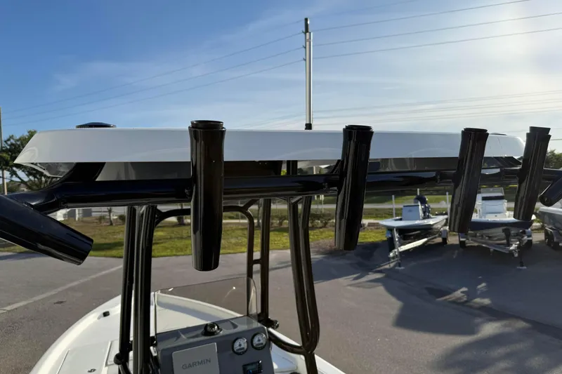 Slide: The Image of 2026 Blazer Bay PURE BAY 2200 boat with rod holders and Garmin electronics. - 28