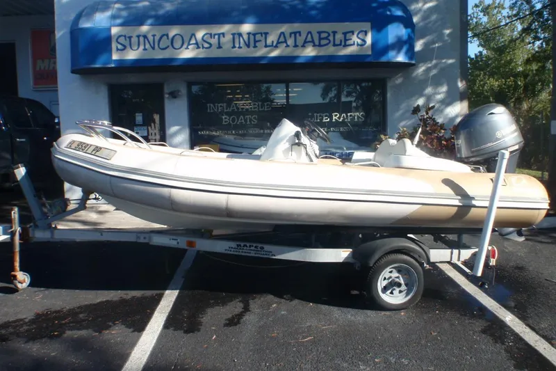 The Image of 2014 Zodiac Yachtline 420 inflatable boat on trailer at Suncoast Inflatables store. - 0