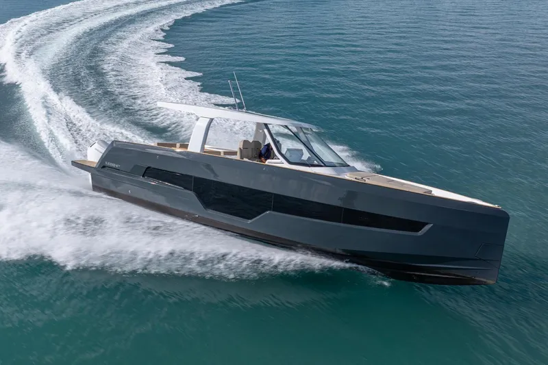 Slide: The Image of 2026 Fjord 41 XP yacht cruising swiftly on open water. - 1
