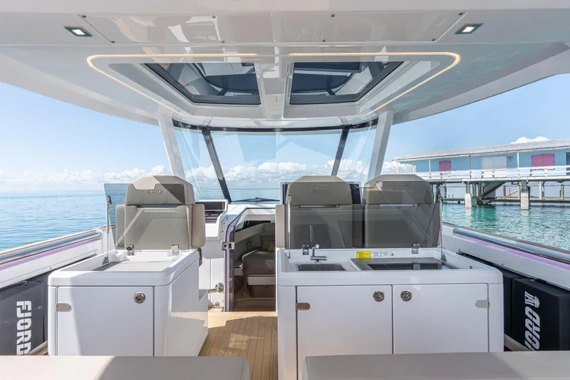 Slide: The Image of 2026 Fjord 41 XP luxury yacht interior with modern design and ocean view. - 18