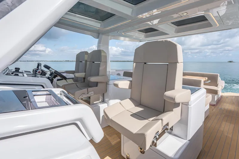 Slide: The Image of Luxurious interior of 2026 Fjord 41 XP yacht with plush seating and ocean view. - 20