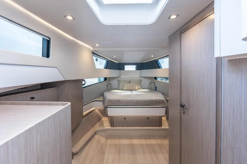 Slide: The Image of Luxurious interior of 2026 Fjord 41 XP yacht with modern design and cozy bedroom. - 23