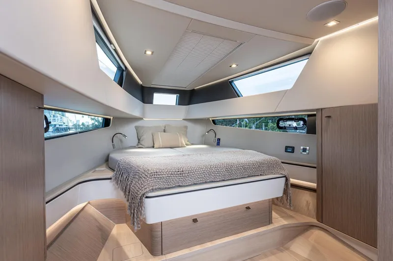 Slide: The Image of Luxurious interior cabin of 2026 Fjord 41 XP yacht with modern design and cozy bedding. - 24
