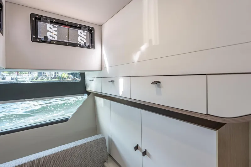 Slide: The Image of Modern interior of 2026 Fjord 41 XP yacht with sleek cabinetry and large window view. - 26