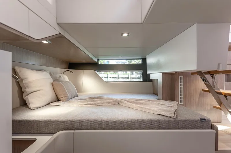 Slide: The Image of Luxurious interior cabin of 2026 Fjord 41 XP yacht with modern bedding and sleek design. - 28