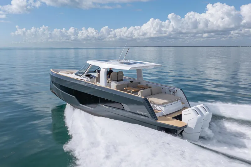 Slide: The Image of 2026 Fjord 41 XP yacht cruising on calm ocean waters under a clear sky. - 3