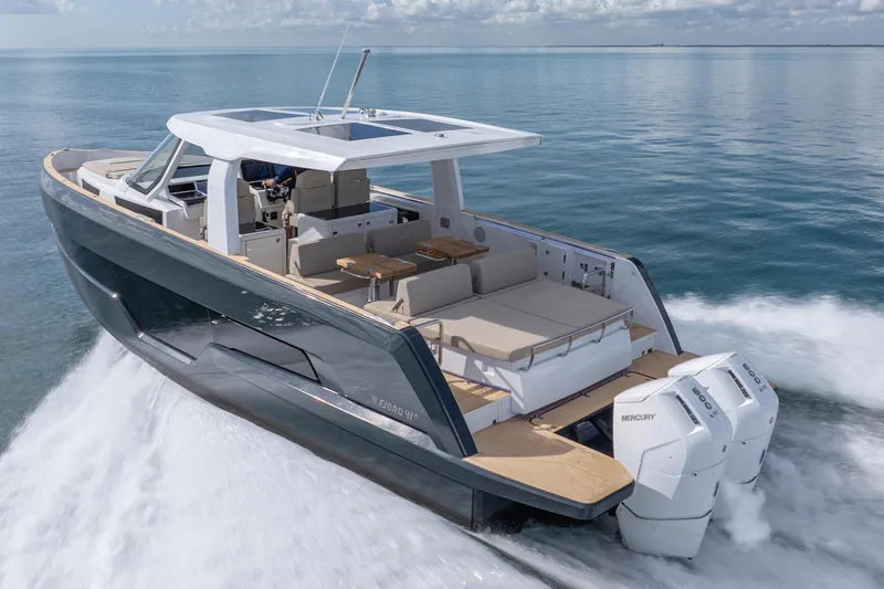 Slide: The Image of 2026 Fjord 41 XP yacht cruising on open water, showcasing sleek design and powerful engines. - 5
